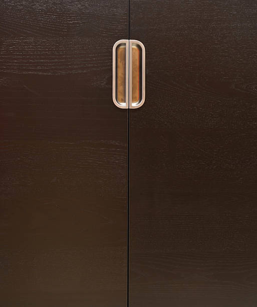 istock Wooden cabinet doors with metal handles 576907424