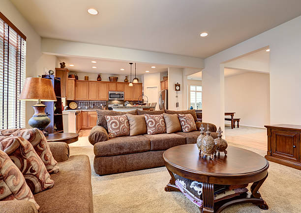 istock Classic brown and white living room interior with carpet floor. 576910402