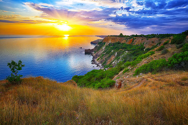 View of Karaul-Oba mountain,Cape Chicken-Kaya and Blue bay on sunset in spring. Noviy Svet. Crimea