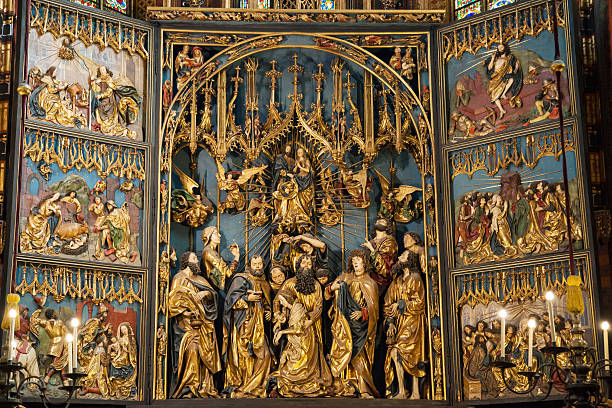 Krakow, Poland - August 14, 2015: Altarpiece of the Saint Mary Basilica in Krakow, Poland. Carved by Veit Stoss between 1477 and 1484, it is the largest Gothic altarpiece in the World.