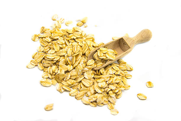 istock oatmeal flakes background photo 576916508