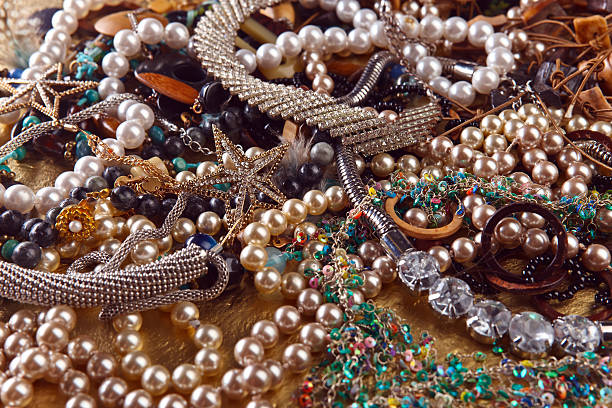 istock jewelry on a gold background 576917880