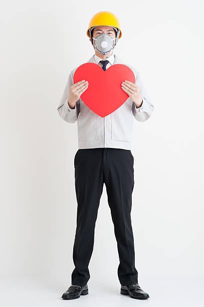 istock Work clothes men who have a heart mark 576917886