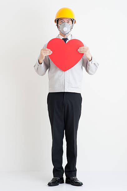 istock Work clothes men who have a heart mark 576918114