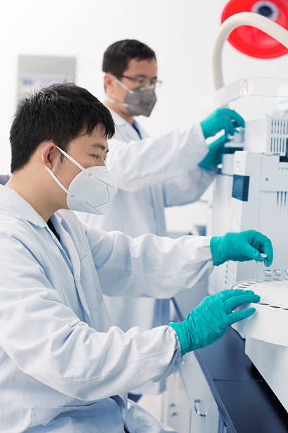 istock Male Working with Specialist Scientific Equipment 576918244