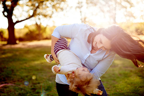 istock Playdate in the park with Mom 576921274