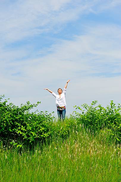 istock Blue sky and women 576921324