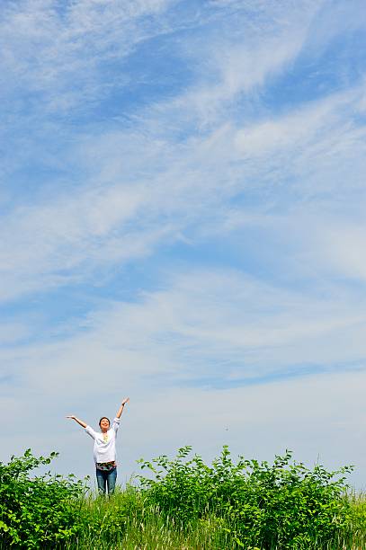 istock Blue sky and women 576921346