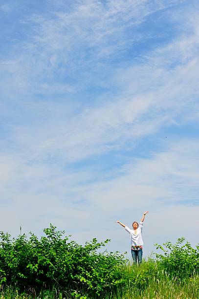 istock Blue sky and women 576921376