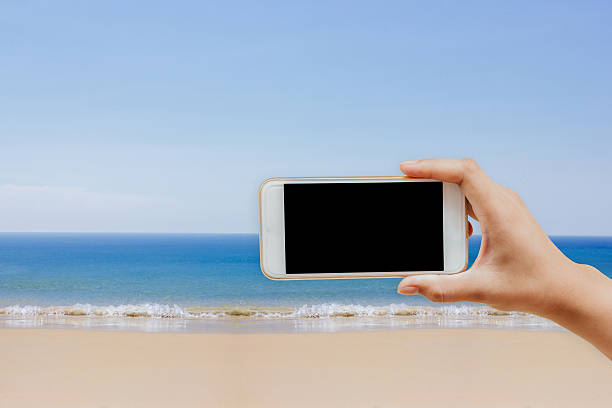 istock blue sea and white sand 576921648