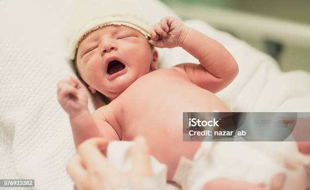 Newborn Yarning Stock Photo - Download Image Now - Newborn, Caesarean Section, Home Birth