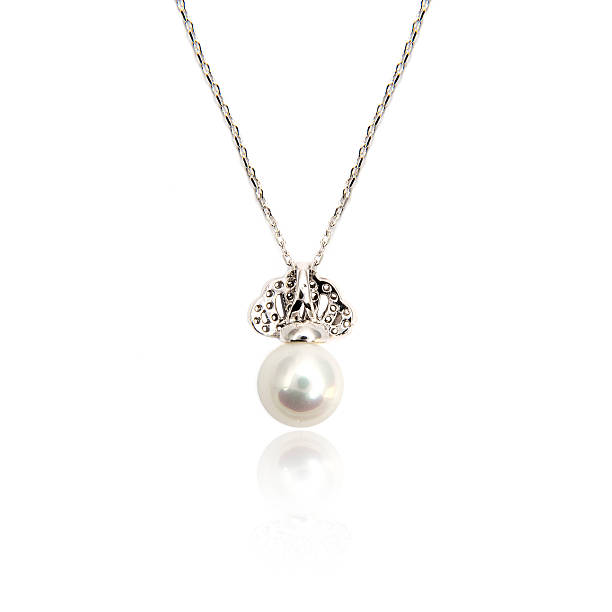 istock Diamond pendant with pearl isolated on white 576924720