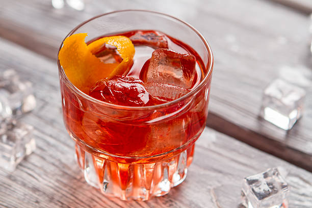 istock Glass with dark orange drink. 576925438