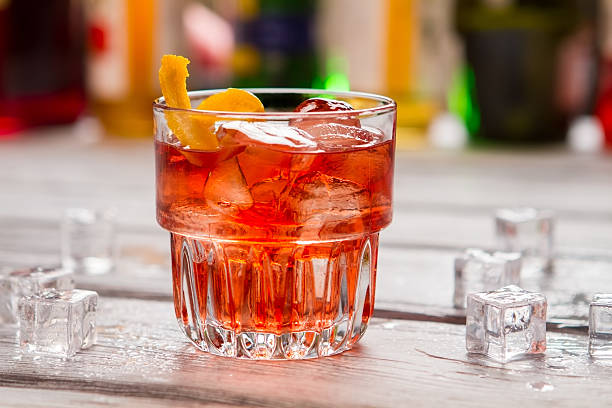 istock Dark orange drink in glass. 576925564