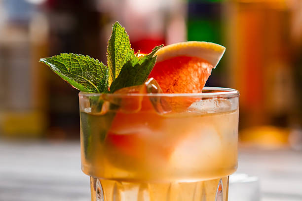 Orange beverage in a glass.