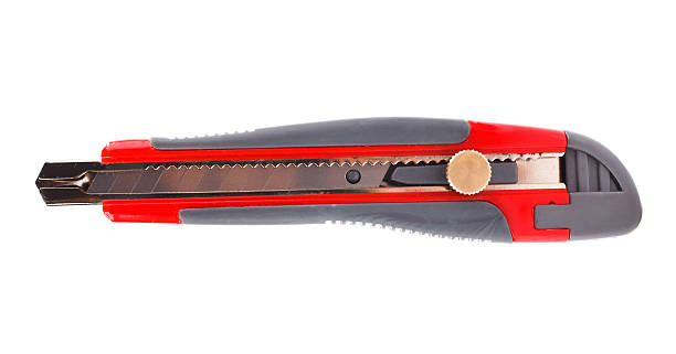 istock red stationery Paperknife on white background 576926768