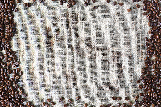 istock Burlap texture with coffee beans border 576927386