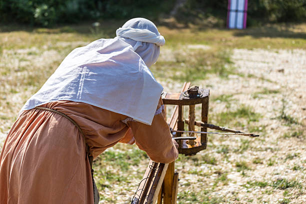 shooting arrows from a ballista - slingshot weapon medieval siege imagens e fotografias de stock