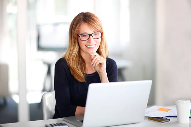 istock Professional woman working on laptop 576929232