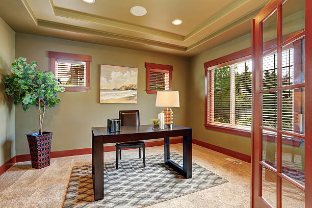 istock Modern home office interior with well designed wooden desk. 576929618