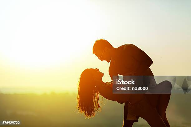 Romantic Dance At Sunset By Couple Stockfoto en meer beelden van Koppel - Koppel, Dansen, Salsadansen
