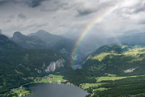 A few sun rays lightened up this beautiful rainbow over the lake Toplitzsee. Nikon D810. Converted from RAW.