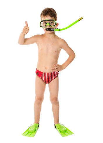 Boy in diving mask with thumb up sign, isolated on white