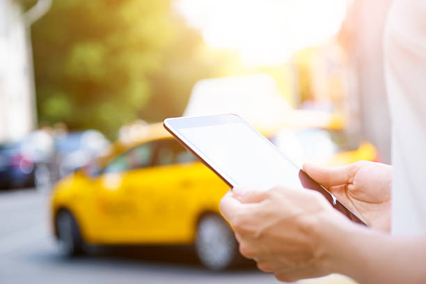 istock Closeup of female hands holding digital tablet 576932134