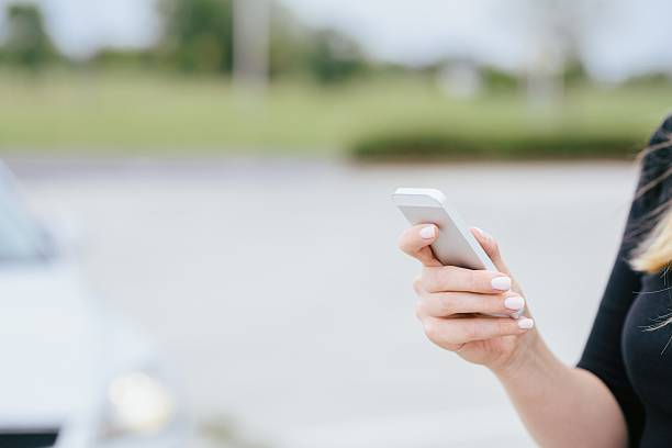istock Woman with phone playing the mobile games 576932824