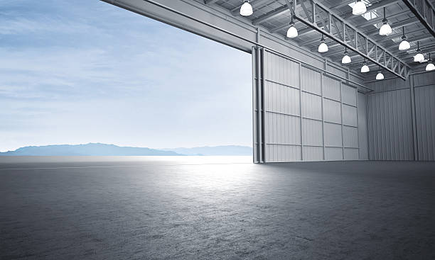 istock Aircraft hanger door open car stage 3D illustration 576933500