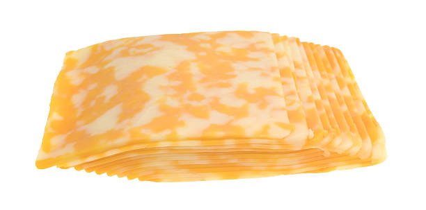 fette di formaggio colby-jack su sfondo bianco - monterey jack il formaggio foto e immagini stock