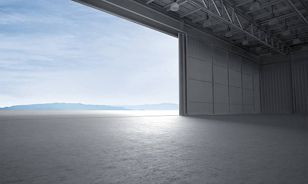 istock Aircraft hanger door open car stage 3D illustration 576933622