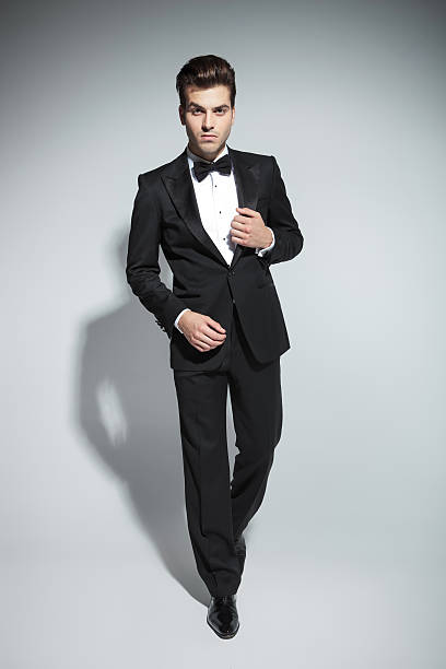 istock Elegant business man fixing his collar 576934506