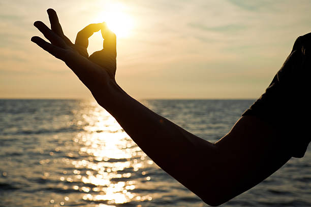 istock Yoga On The Beach 576935490
