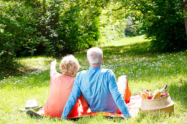 istock Senior couple relaxing outdoor 576935748