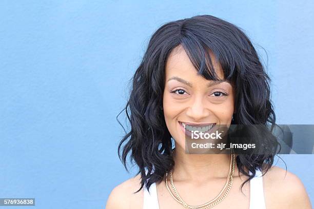 Laughing African American Woman With An Wavy Hairstyle Stock Photo - Download Image Now