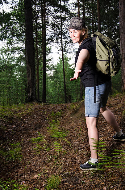 istock Girl traveling in the forest 576937336