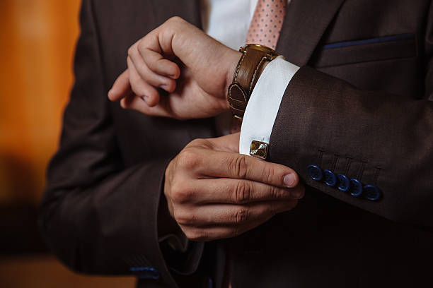 istock Businessman hands with cufflinks. Elegant gentleman clother 577303948