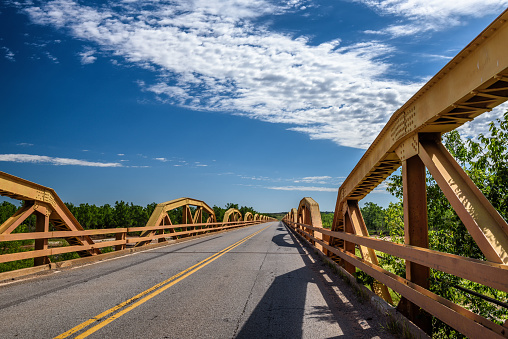 Pony Bridge on route 66 in Oklahoma, United States. It crosses the South Canadian River and is also known as William H. Murray Bridge.