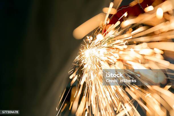 Details Of Sparks From A Grinder On The Floor Stock Photo - Download Image Now - Sparks, Welding, Welder