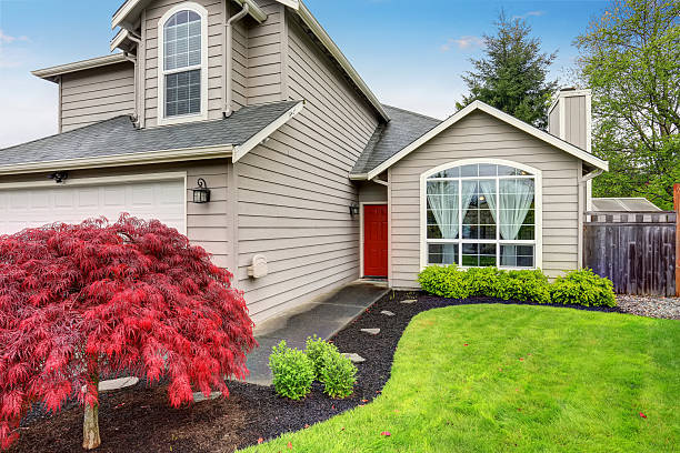 istock American classic home with beige exterior paint. 577304582