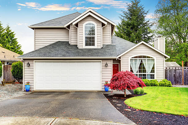 istock American classic home with beige exterior paint. 577305914