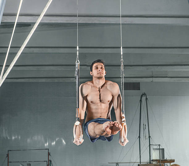 istock Gymnast on Stationary Rings 577308998