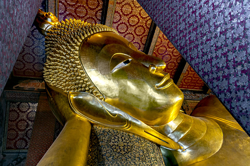 Reclining Buddha Gold Statue at Wat Pho, Bangkok, Thailand