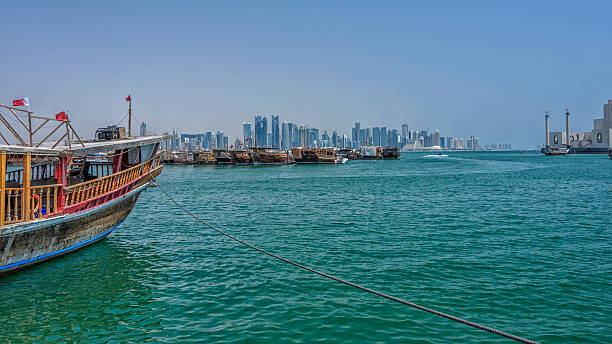 istock Dhow boat at ancor in front of Doha skyline 577312160