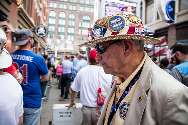 Man in Trump Hat at 2016 RNC Cleveland OH, USA - July 17, 2016: Man in Trump Hat outside RNS 2016 hillary clinton stock pictures, royalty-free photos & images