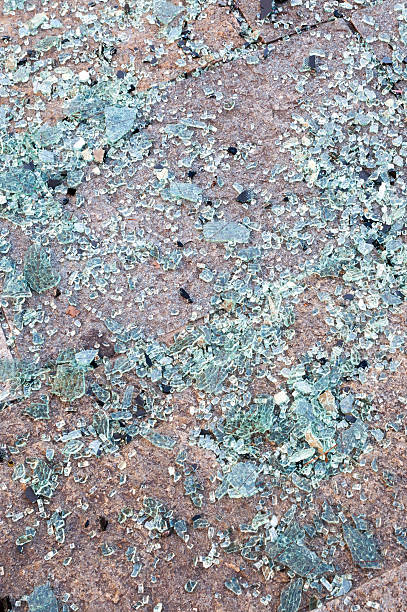 istock glass debris from car crash on the road 577317184