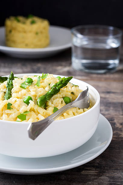 istock Risotto with asparagus and peas 577317392