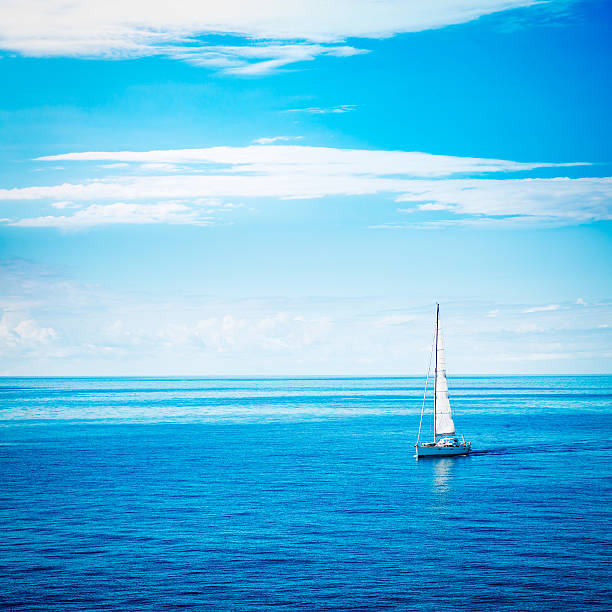 Beautiful Seascape with White Yacht Sailing in Calm Blue Sea. Square Photo with Copy Space.