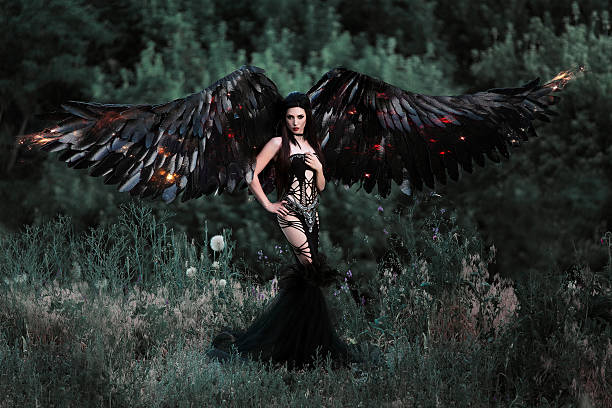 istock Black Angel. Pretty girl-demon 577318748